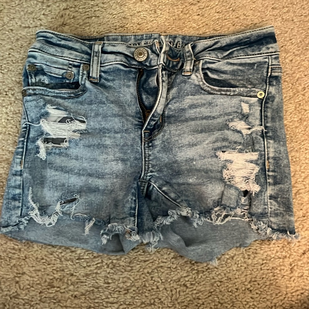 American Eagle distressed stretchy blue jean shorts